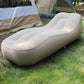 Ergonomic inflatable bed for outdoor relaxation