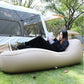 Ergonomic inflatable bed for outdoor relaxation