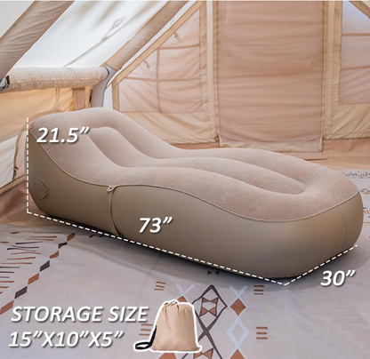 Ergonomic inflatable bed for outdoor relaxation